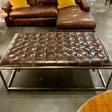 Universal Tufted Leather And Brass Bass Ottoman/Coffee Table 50" Lx 32"D x